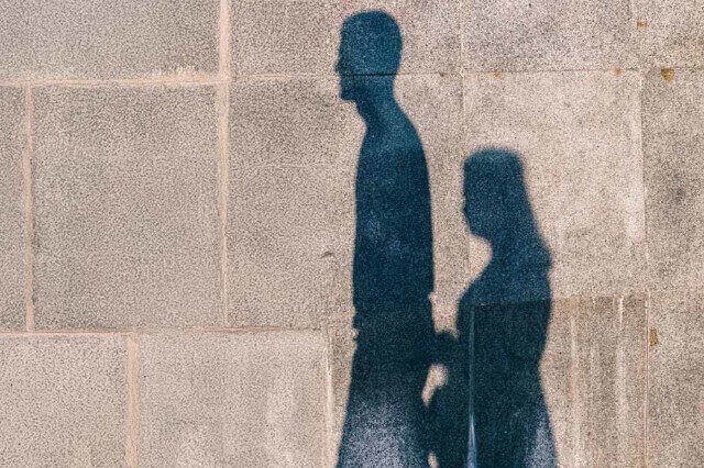 shadows of a man and a woman