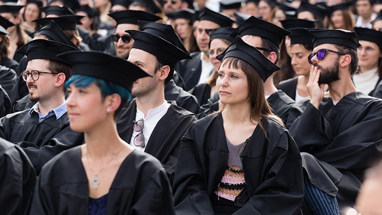 People during a doctoral ceremony