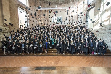 Cap-throwing  PhD graduation ceremony